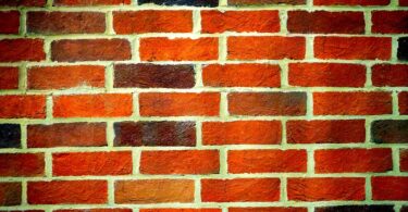 landscape photography of orange brick wall