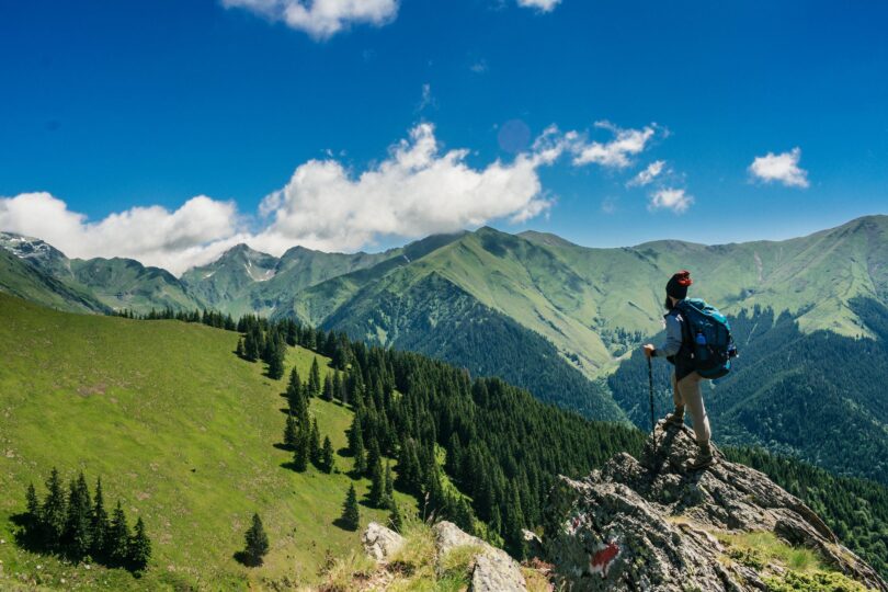 man standing on a rock