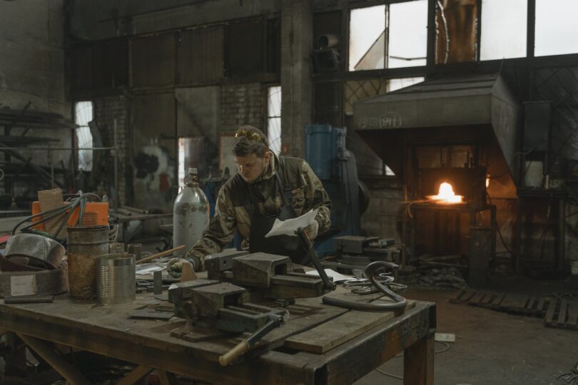 a man doing blacksmith