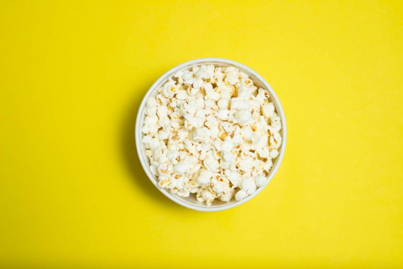 popcorn serving in white ceramic bowl