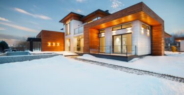 luxurious cottage house facade in winter