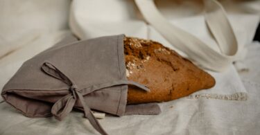brown bread on white textile