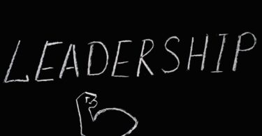 leadership lettering text on black background