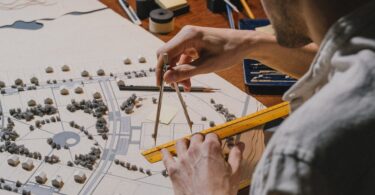 architect working with architectural model